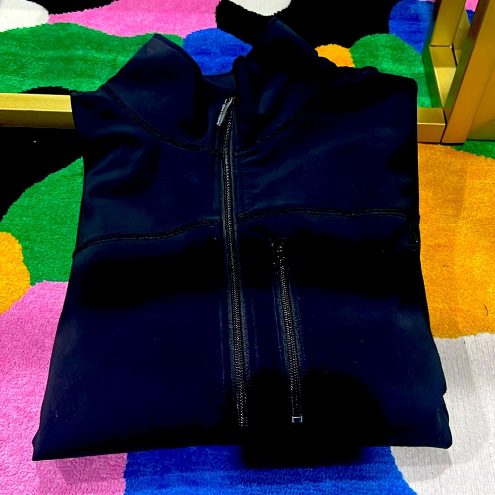 Gently used jacket for men 100% authentic great for a rainy day